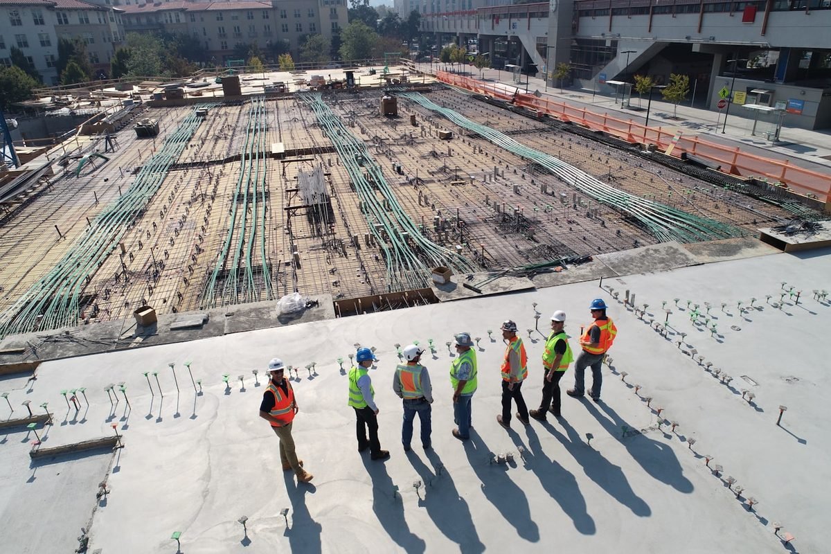 Engineers of Om Infra Projects planning industrial construction work